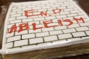 "End Ableism" printed on a sugar cookie <span class="cc-gallery-credit"></span>